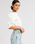 MILLE Lila Top in White – outdoor portrait