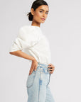 MILLE Lila Top in White – styled with wide-leg trousers