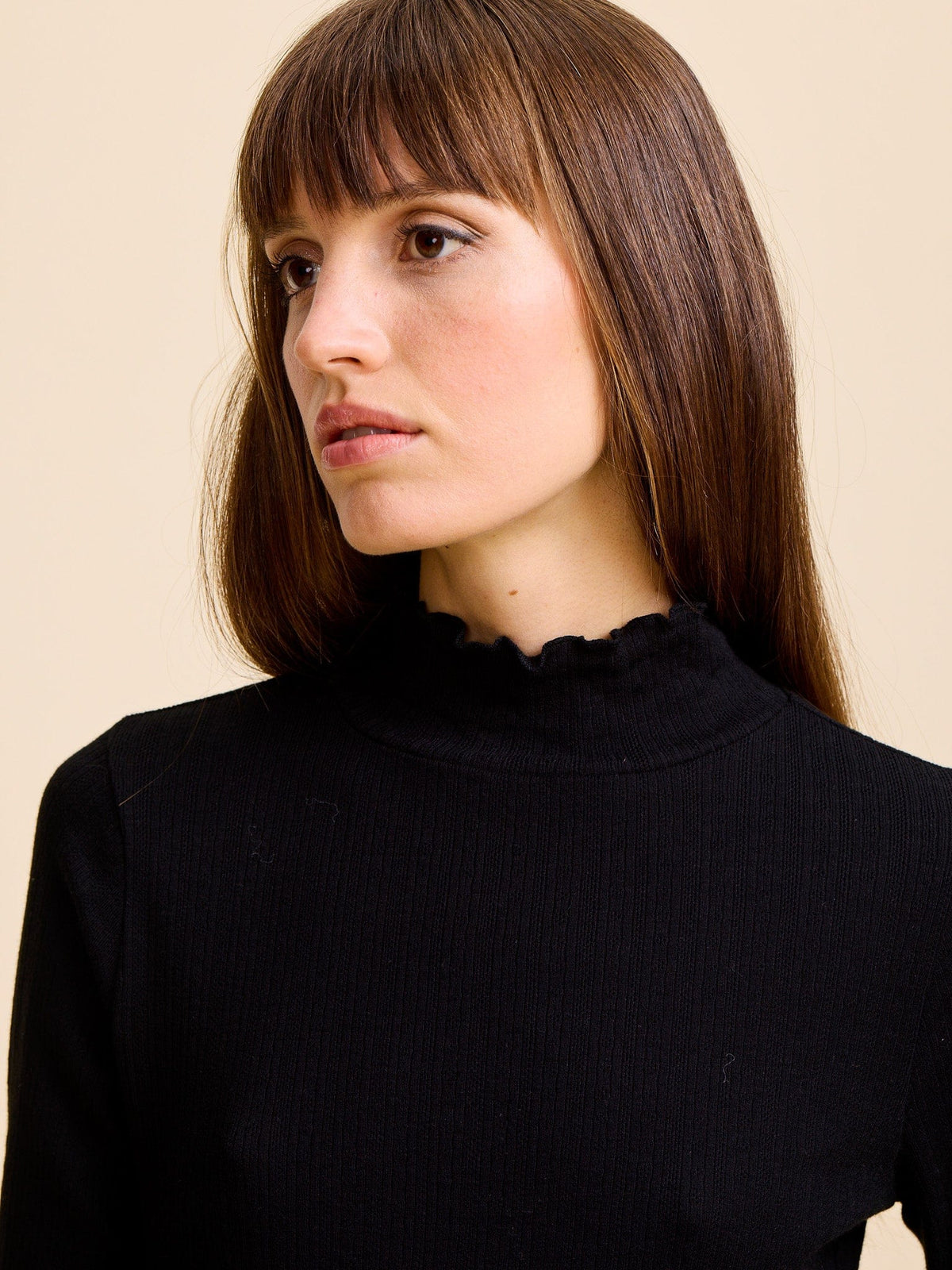 Carmela Pointelle Turtleneck in Black — The knit