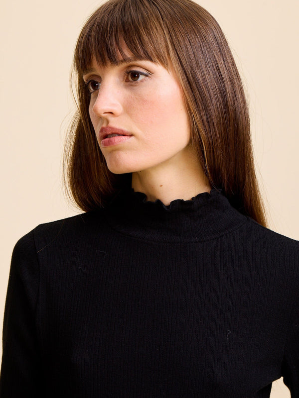 Carmela Pointelle Turtleneck in Black — view 2